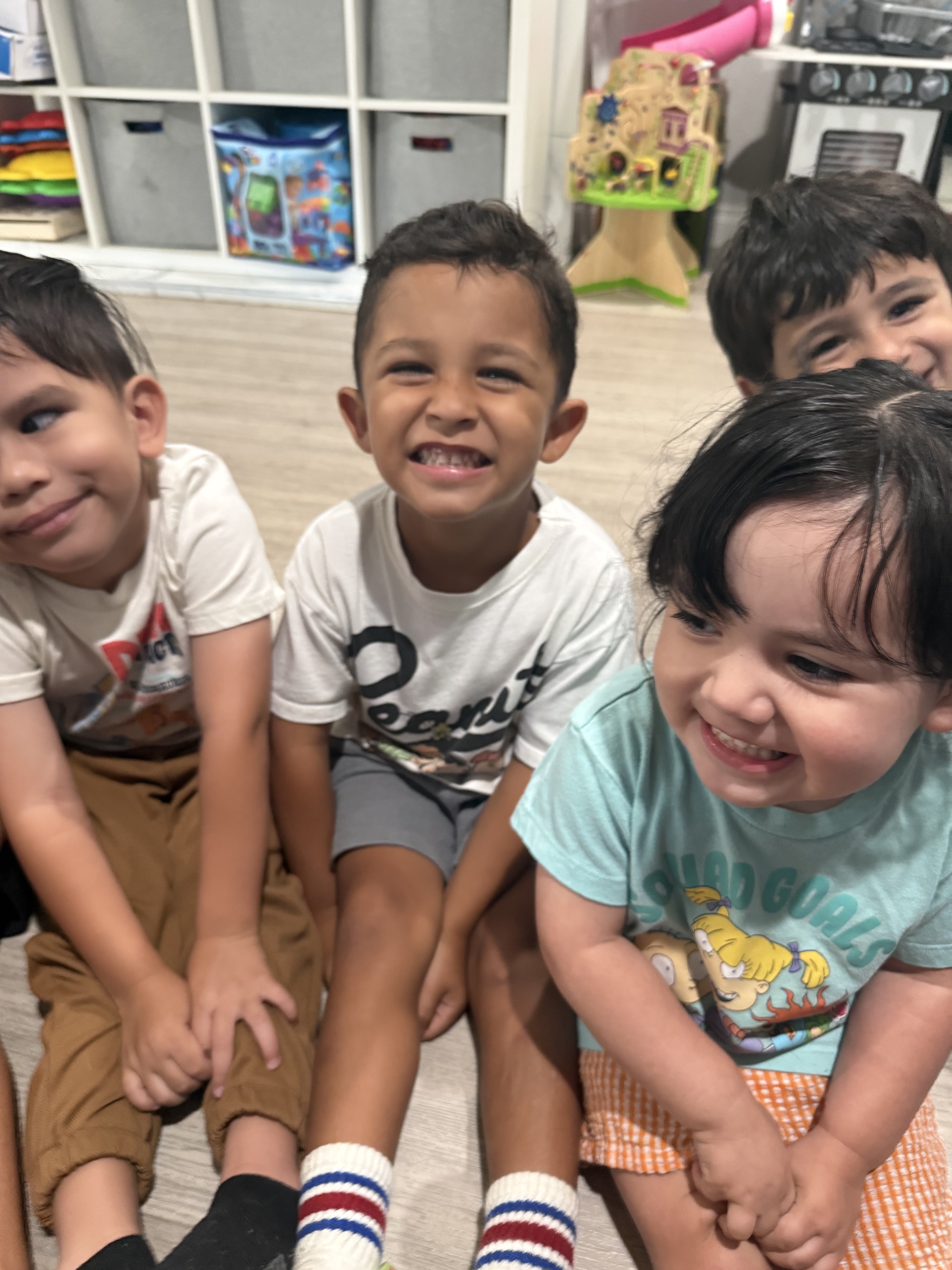A happy group of children enjoying time together at Little World Changers